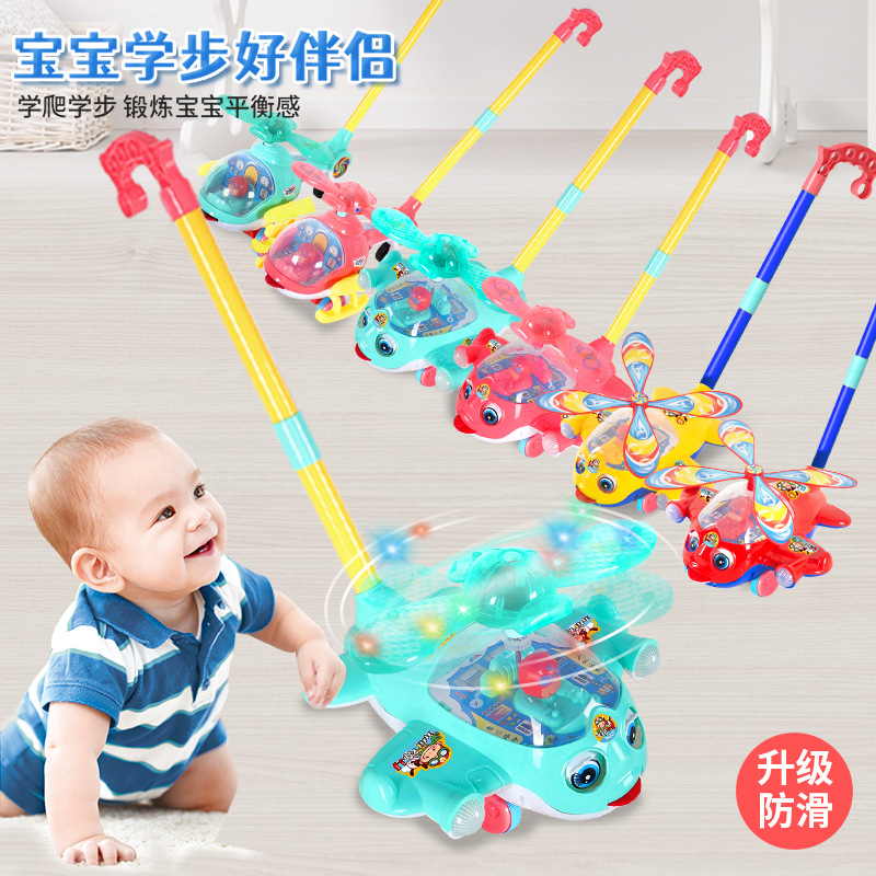 Picture of Children's Hand Pushing Airplane Toddler Push Pushing Music Baby Early Education Story Machine Trolley Toys Single Pole Children's Walkers