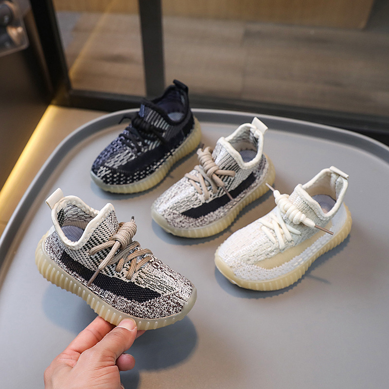 2025 Autumn Children's Coconut Shoes Soft Soled Baby Shoes Boys and Girls Fly Knitted Breathable Mesh Shoes Campus Solid Soled Sports Shoes