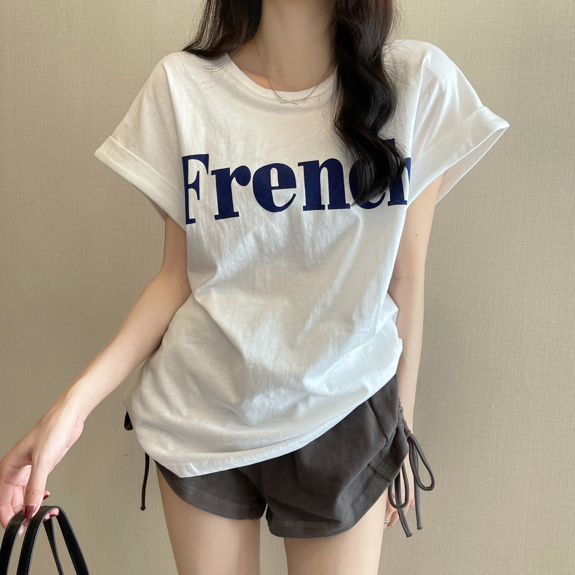 Picture of 2025 New Online Celebrity Ins Super Hot Slim Shoulder Sweet Cool Short-sleeved T-shirt Loose Women's Summer Student Top Trendy