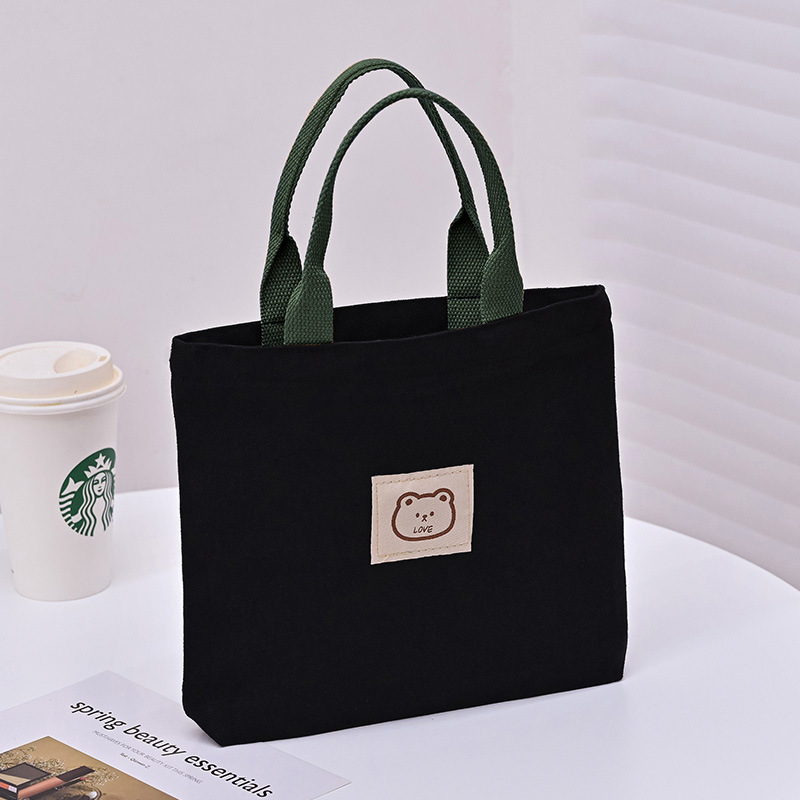 Picture of 2025 New Cute Cartoon Japanese Style Canvas Bag Tutorial Lunch Bag Manufacturer Wholesale Bag Women's Bag Handbag