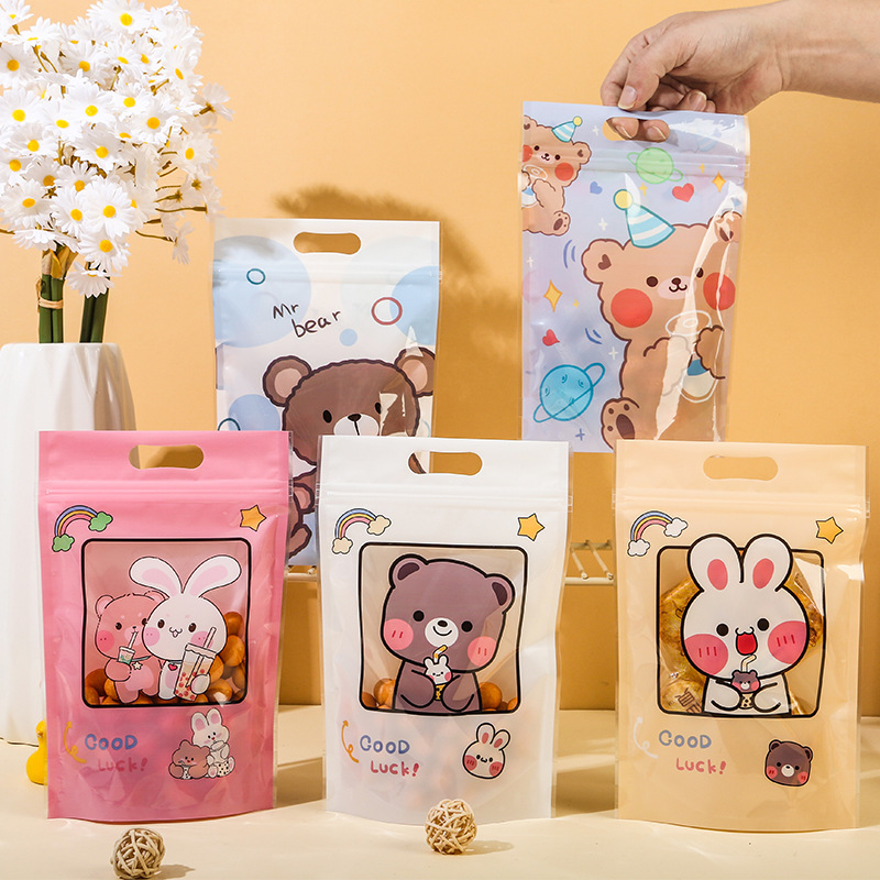 Cartoon food self-supporting self-sealing bag snacks snowflake crisp sealed thickened self-supporting bag scented tea snack food packaging bag