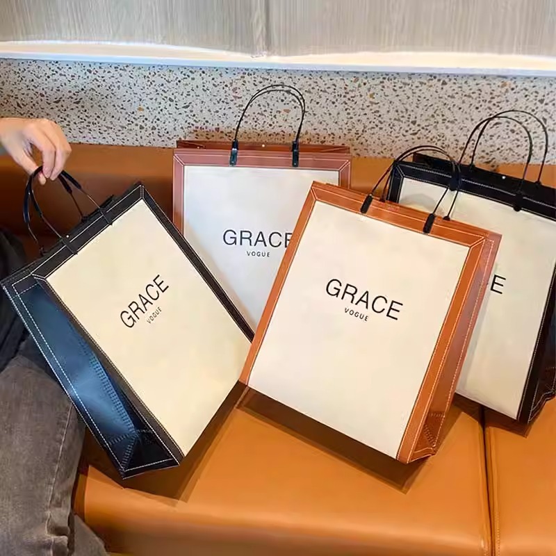 High-end Clothing Store Non-woven Shopping Satchel Ear Bag Women's Clothing Packaging Clothing Gift Packaging Can Be Printed with LOGO