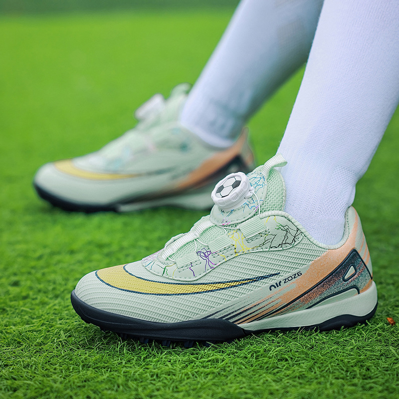 Rotating buckle children's football shoes, for boys and girls, for elementary school girls, breathable professional TF stud training and competition wholesale