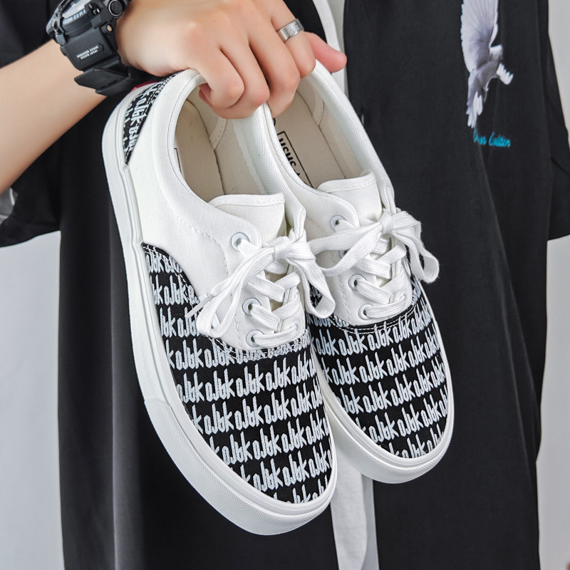 Spring low-top men's shoes new color matching lace-up canvas shoes men's fashion Joker board shoes lovers casual shoes wholesale