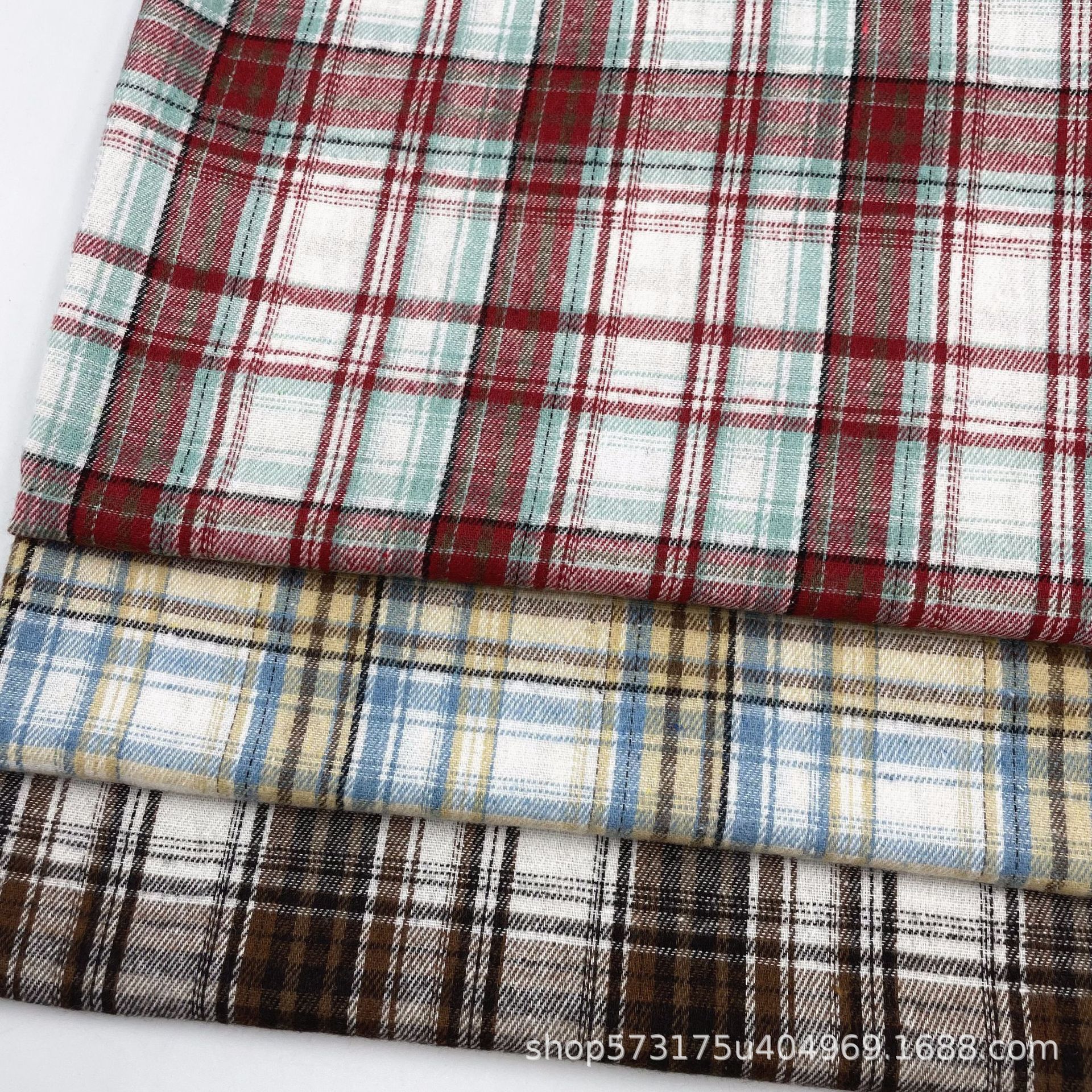 Autumn and winter flannel shirt cloth skirt trousers shoes and hats luggage fabric polyester cotton sanding yarn-dyed plat