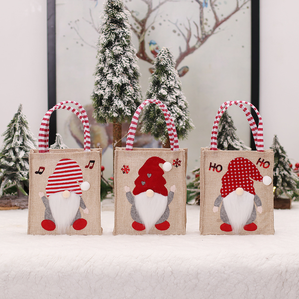 Factory wholesale Christmas faceless doll linen gift bag forest candy bag ground essence gift bag handbag