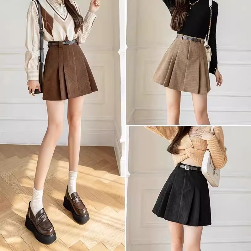 Corduroy pleated midi skirt for women, 2024 new autumn/winter high-waisted slimming hip-hugging petite black A-line short skirt