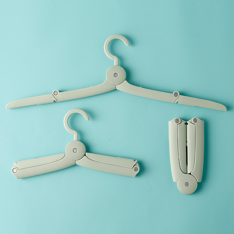 Picture of Folding Clothes Hanger Portable Travel Clothes Hanging Travel Multifunctional Clothes Retractable Clothes Hanger Household Clothes Support Clip
