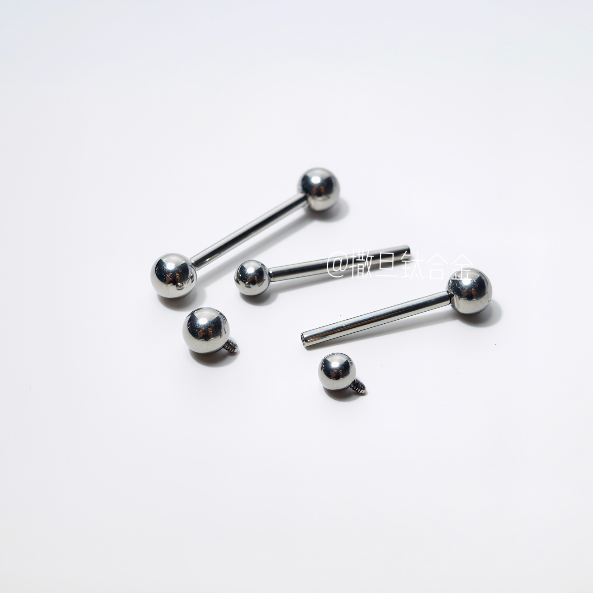Picture of Titanium alloy tongue nail F136 internal thread tongue nail 14G anodized color change puncture jewelry double ball tongue nail