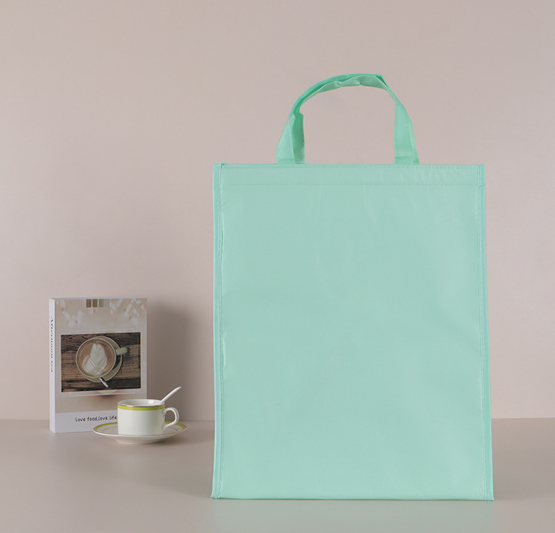 Picture of 6-inch 8-inch cake insulation bag in stock non-woven laser aluminum film insulation bag takeaway ice bag can be printed logo