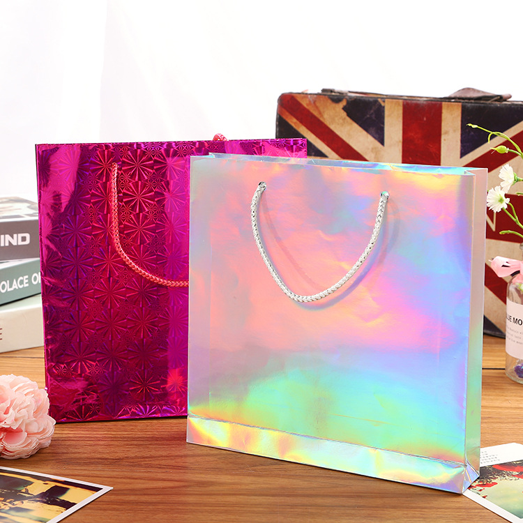Laser paper high quality fashion personality handbag coated paper bag gold and silver cardboard paper bag clothing packaging bag