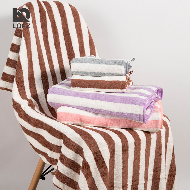 Picture of Towel coral fleece thickened double-sided fleece face towel absorbent edging non-cotton striped dry hair towel wholesale