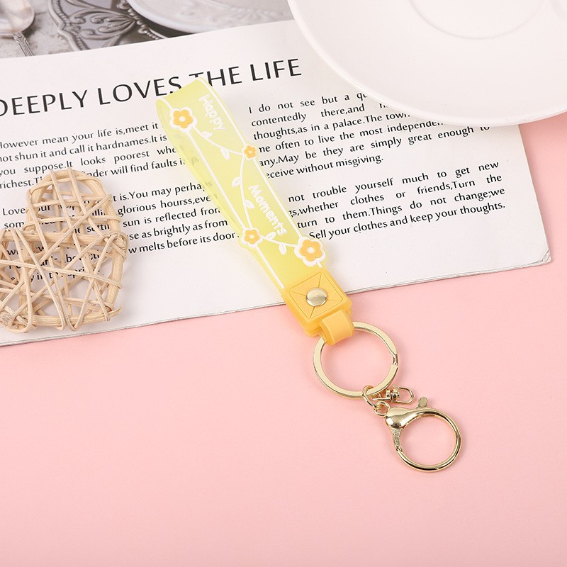 Picture of Transparent candy color soft rubber leather rope keychain small fresh flower creative small accessories cute women's exquisite hand strap
