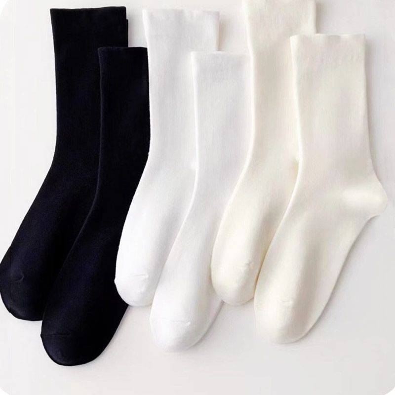 Mid-calf length socks women's confinement socks spring and autumn boneless socks student pile socks loose mouth not tight feet Japanese style simple solid color
