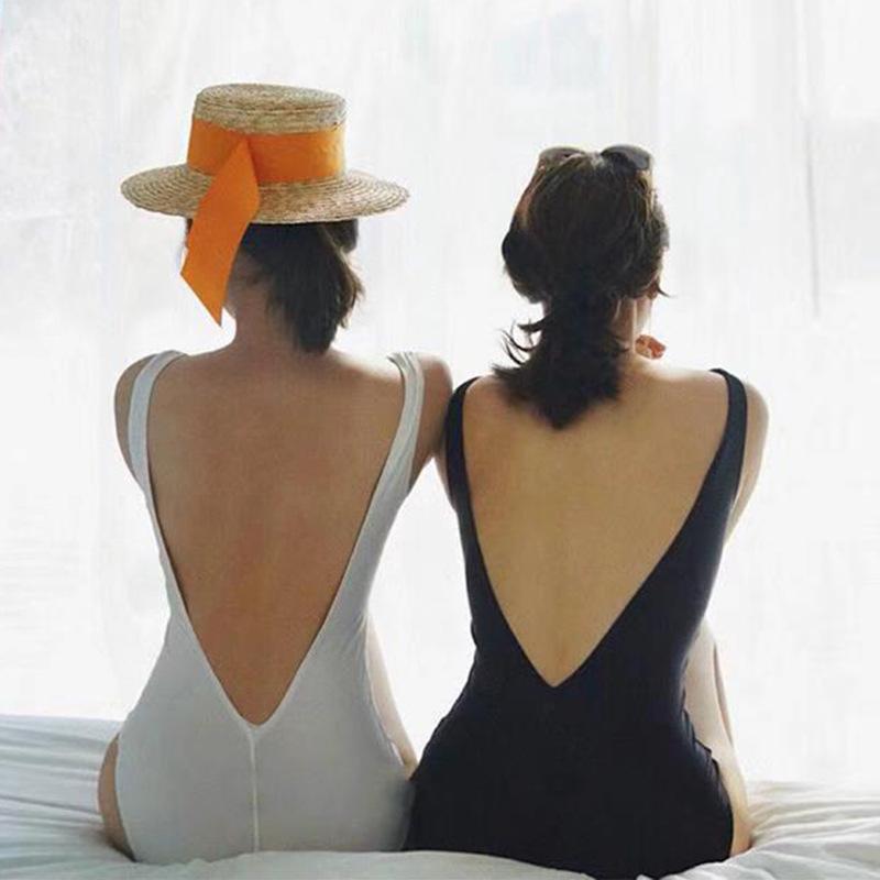 Wholesale South Korea bare back deep V sexy triangle one-piece swimsuit women black temptation simple hot spring swimsuit factory