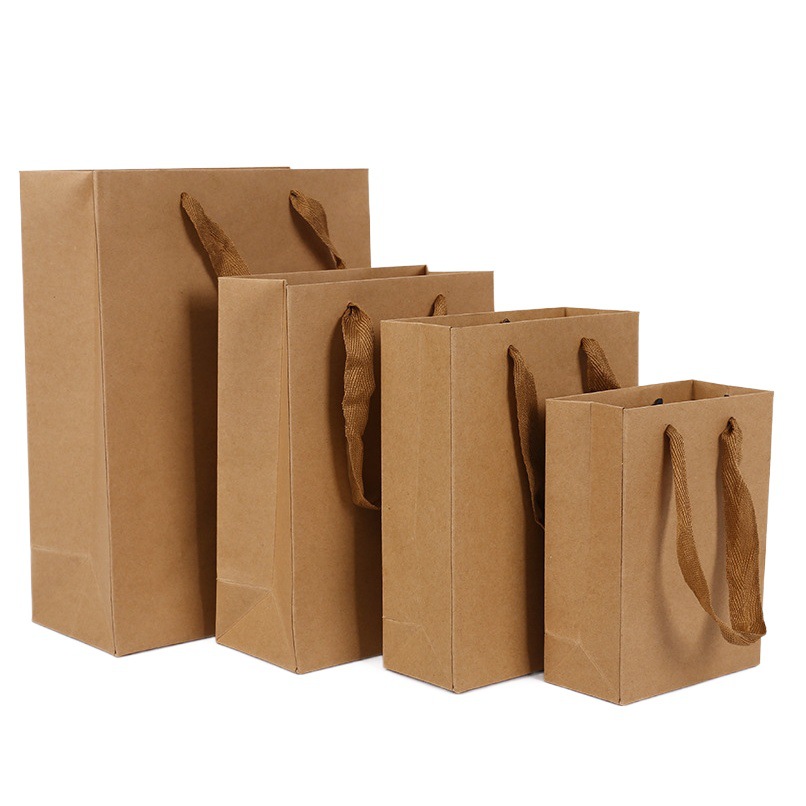 Thickened Kraft paper bag spot wholesale gift hand bag clothing store clothes paper bag printed logo tote bag manufacturers