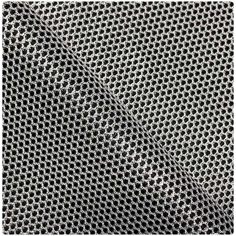 In stock manufacturer diamond-shaped plaid two-color mesh cloth shoe material bag polyester weft knitted hexagonal two-color mesh cloth