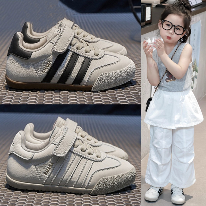 Girls' black and white leather training shoes, 2025 spring and autumn children's shoes, boys' soft-soled sneakers, children's versatile white shoes