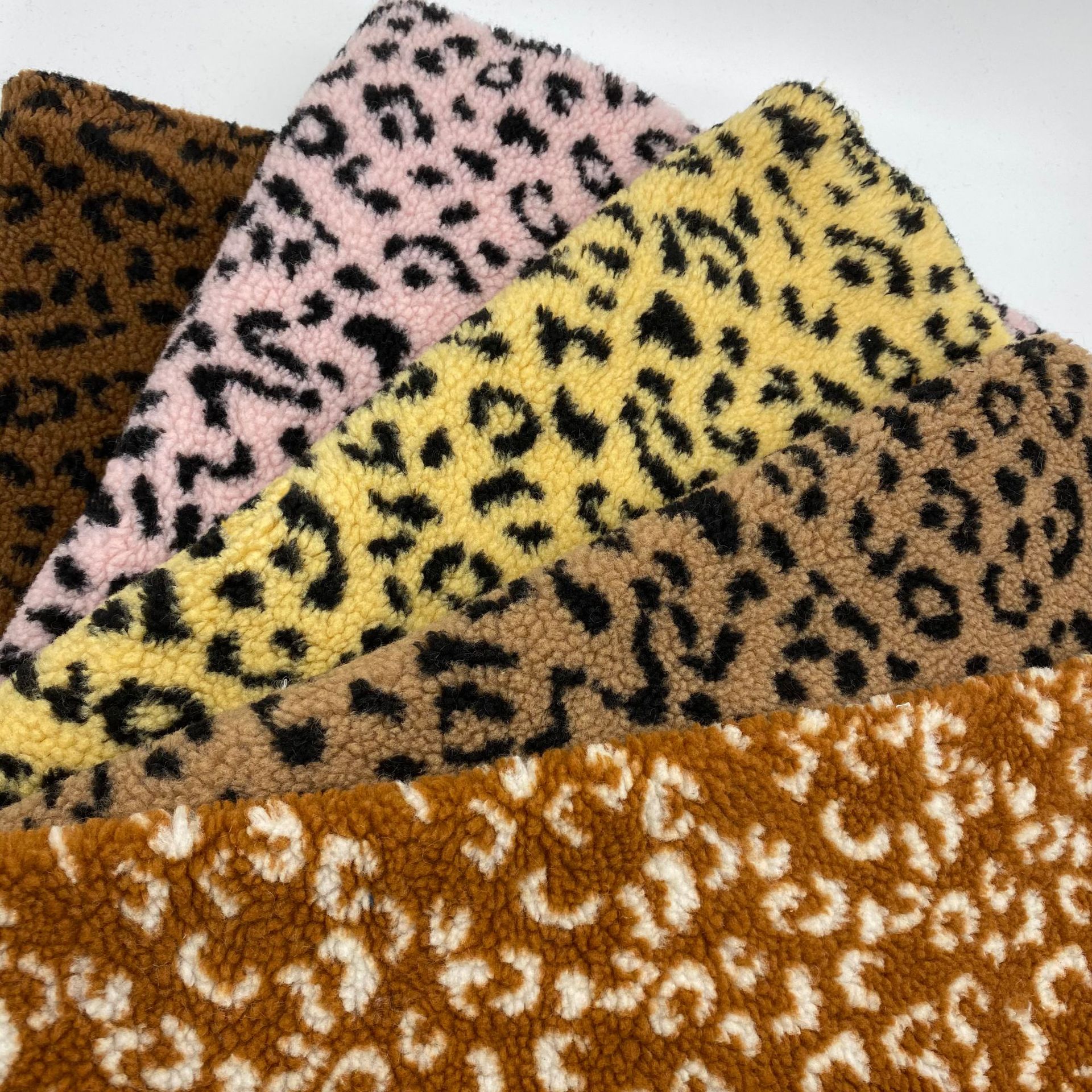 Lamb wool jacquard small leopard print spot particle type clothing plush flannel fabric lamb wool jacquard