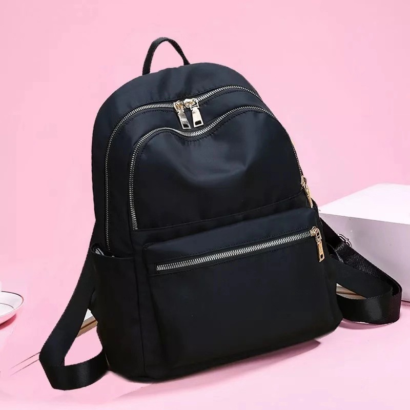 Picture of Backpack Women 2024 New Trendy Travel Oxford Cloth Small Backpack Women's Versatile Fashion Canvas Small School Bag