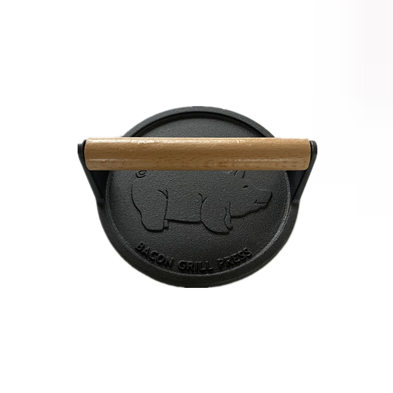 Picture of Tols cast iron pig round meat plate barbecue utensils meat Press produced South Korea tail single uncoated wooden handle