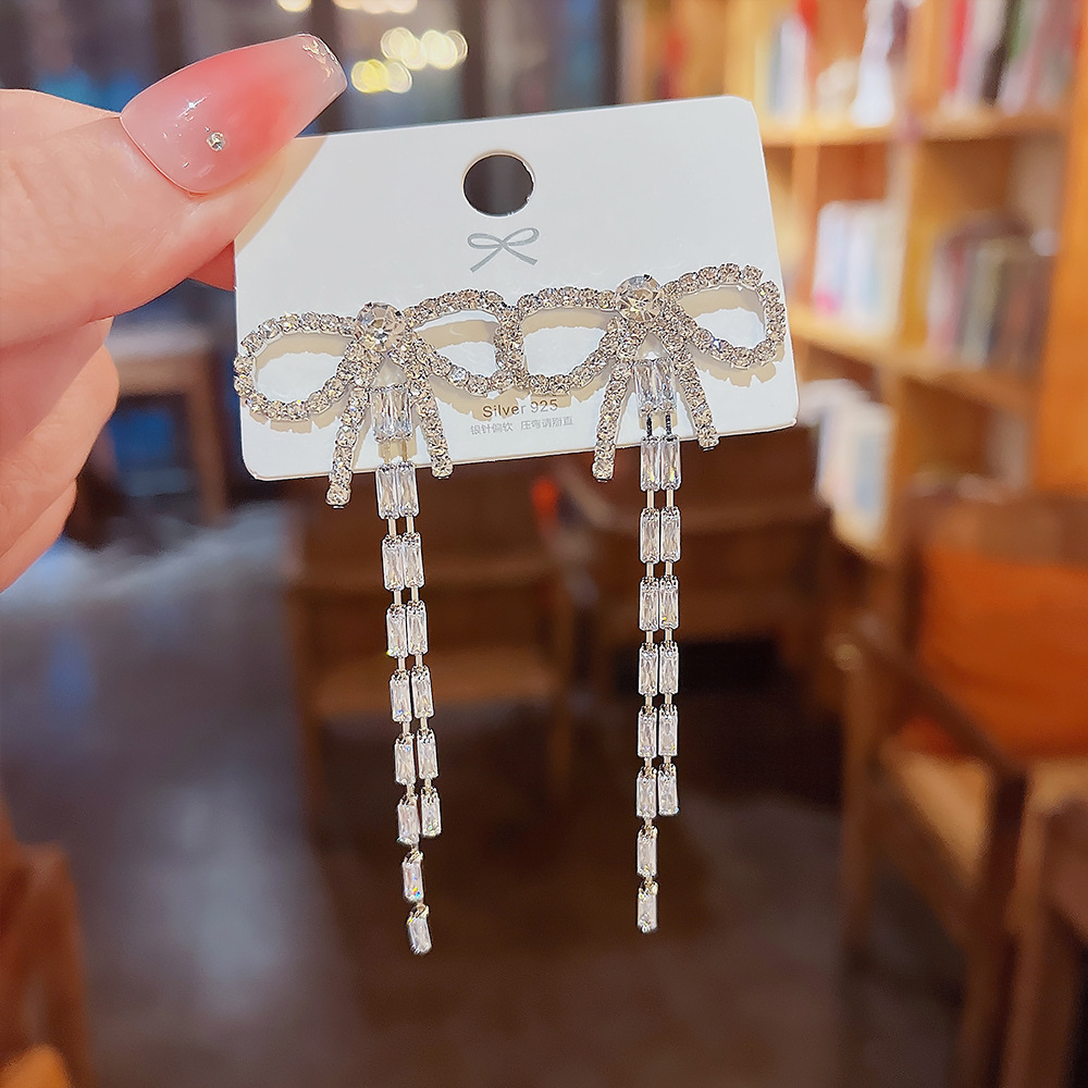 Korean version of Dongdaemun micro inlaid with diamond butterfly tassel long 925 silver needle Super Flash temperament socialite wind earrings wholesale