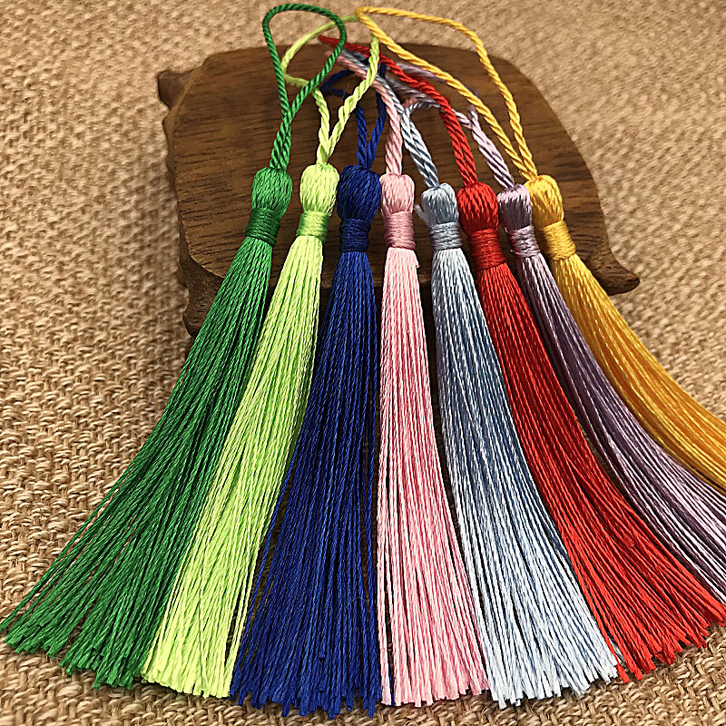 Picture of Spot wholesale vertical tassel tassel bookmark tassel box fan small tassel small hanging spike diy to sample