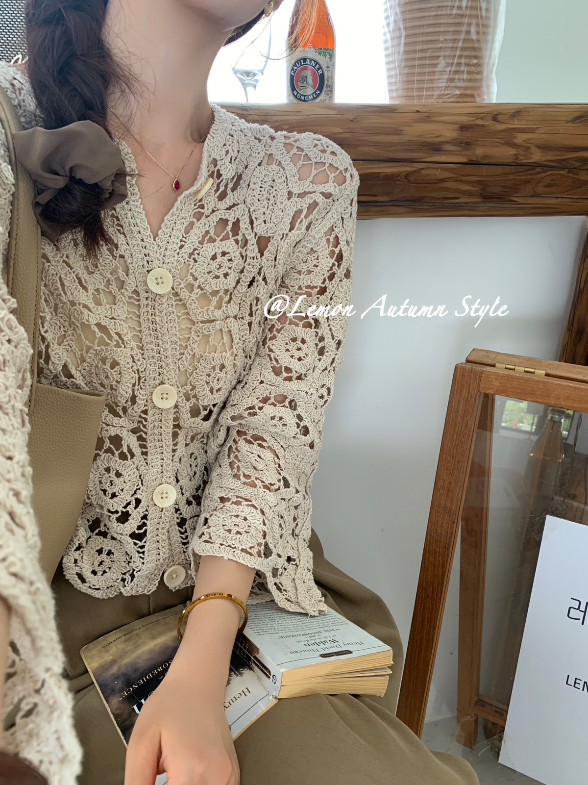 Picture of Women's long-sleeved hollow-out knitted cardigan summer wear new crocheted short chic small shirt with skirt air conditioning top