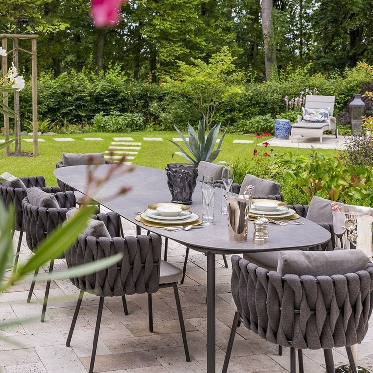 Nordic Outdoor rope woven table and chair Villa Garden Outdoor rattan chair terrace waterproof rock plate marble dining table and chair