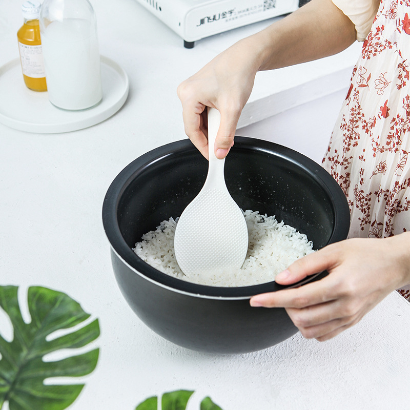 Picture of Japanese spoon rice creative simple rice spoon vertical non-stick rice spoon self-supporting non-dirty