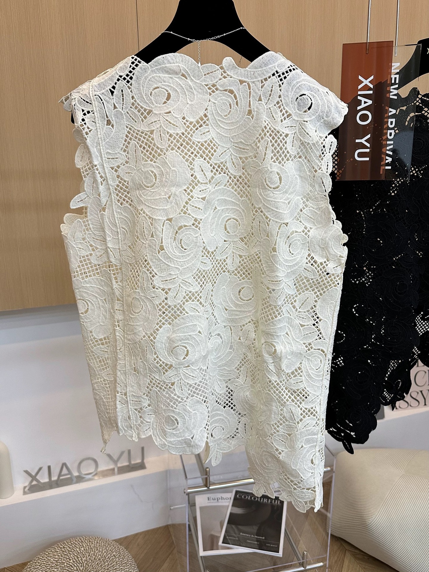 Picture of High-end European summer new unique hook flower hollow irregular hem sleeveless vest lace shirt girl