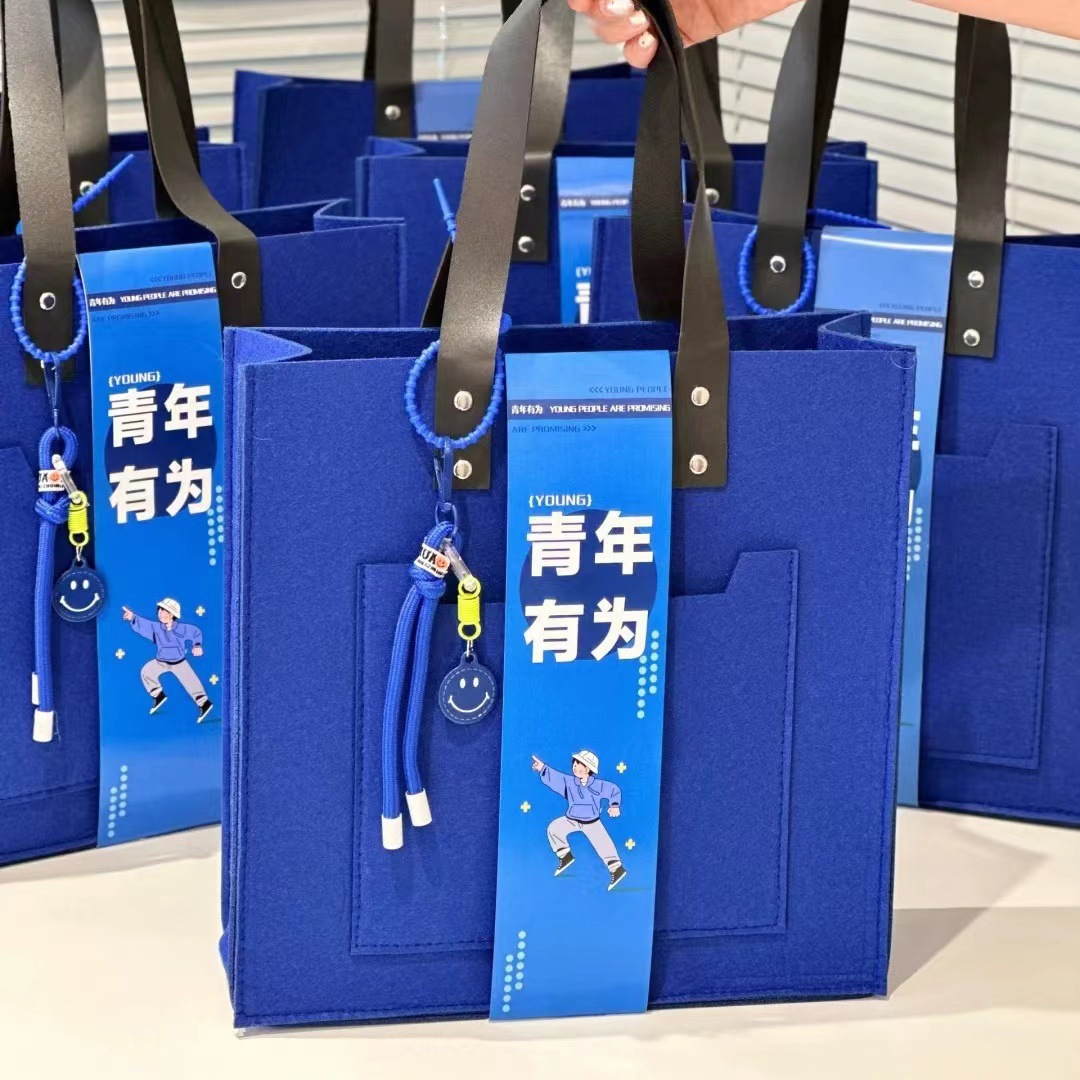 Picture of Little Red Book Portable Felt Bag 2025 Year of the Snake New Year Gift Box New Creative Accompanying Gift Annual Meeting Anniversary of Enterprises