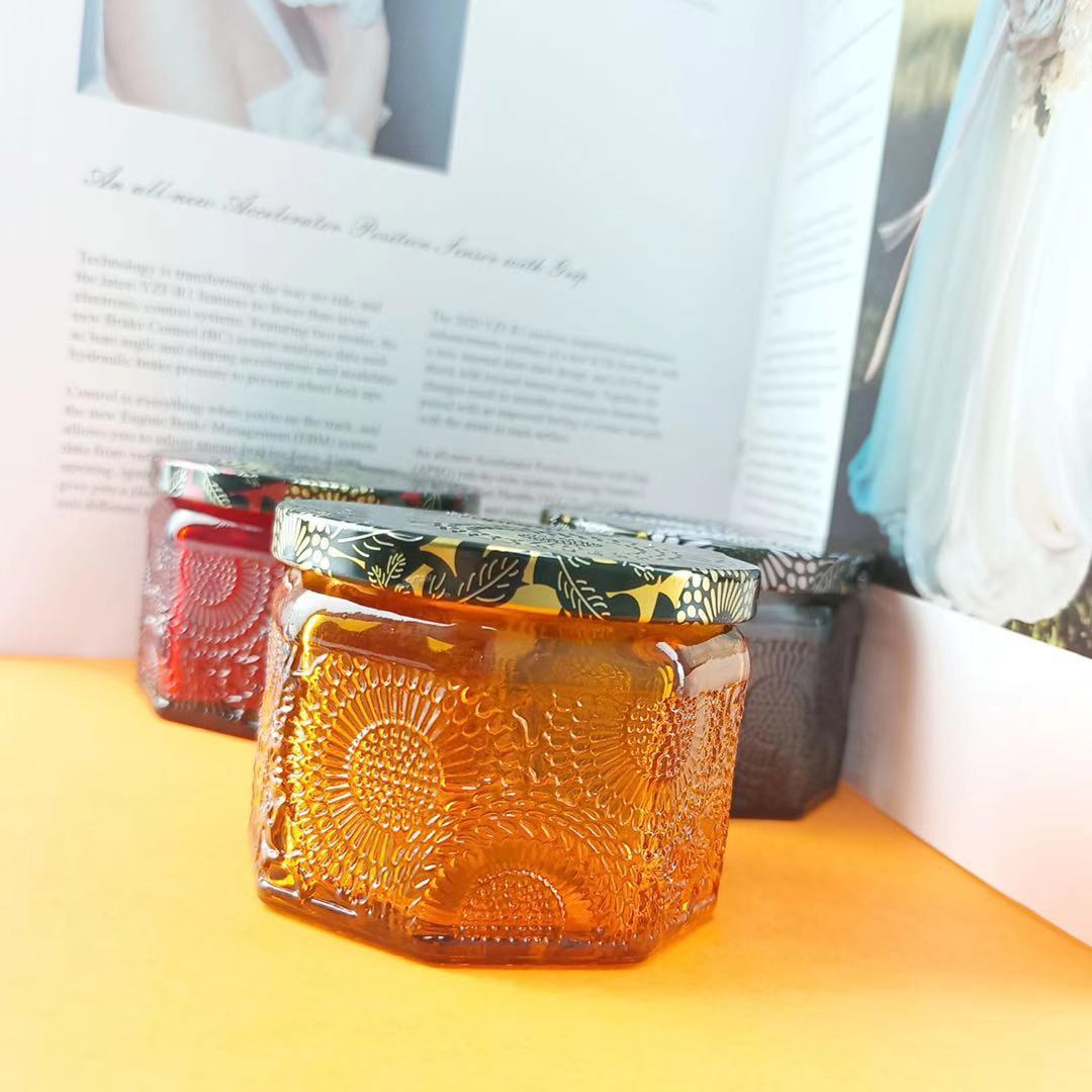 Picture of Hexagon Mini Embossed Pattern Candle Jar Colorful Aromatherapy Candlestick Bottle Amber Embossed Glass Candle Bottle