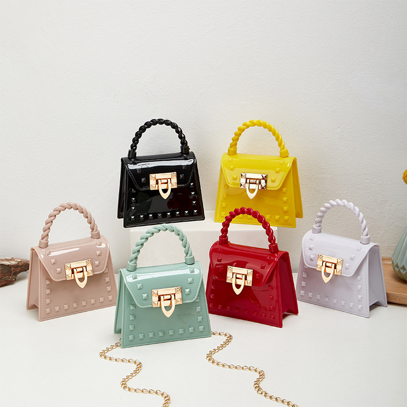 2023 new fashion simple solid color rivet portable PVS mini jelly bag shoulder slung mouth red envelope wholesale