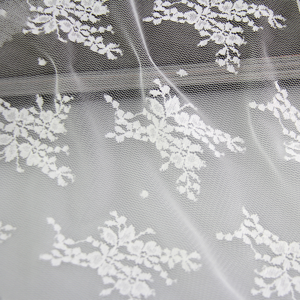 White micro-elastic wedding dress mesh fabric hollow peony flower embroidered mesh fabric in stock