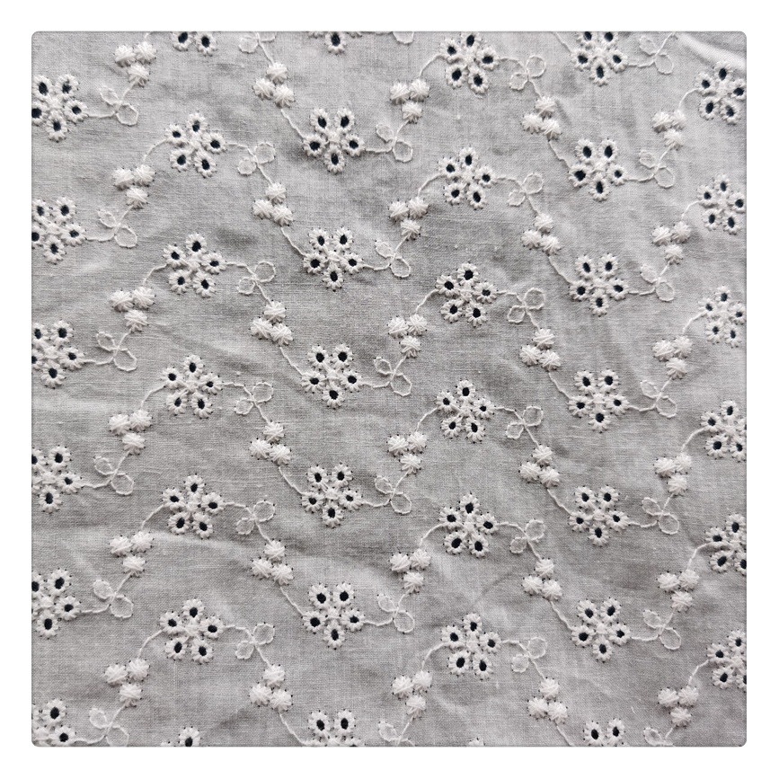 In stock supply cotton large machine punching embroidery fabric small flower embroidery cloth flat embroidery cloth