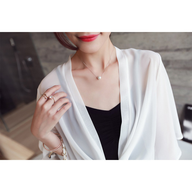 Picture of Wholesale 2025 New Korean Style Chiffon Sun Protection Clothing Fashionable Women's Black and White Shawl Jacket Beach Clothing One Piece Spread