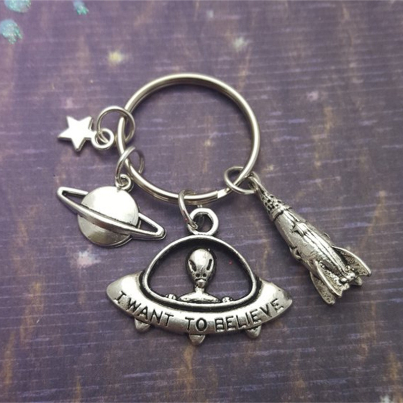 European and American foreign trade alien spaceship rocket planet golden key chain key ring pendant wholesale