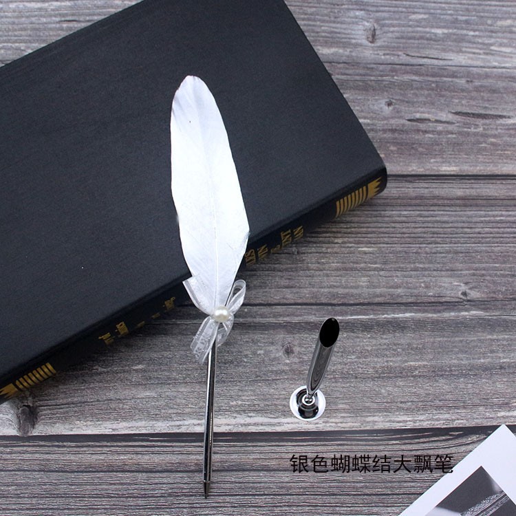 Picture of New European retro silver feather pen creative ballpoint pen wedding signature advertising pen student stationery simple package
