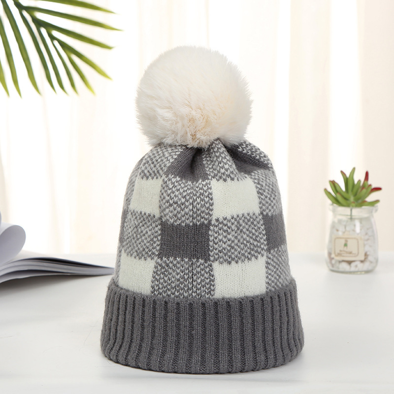 Picture of Korean Style Women's Autumn and Winter Warm Hat with Artistic Plaid Design, Rabbit Fur Pom-Pom, Fashionable Knitted Hat with Artistic Flair