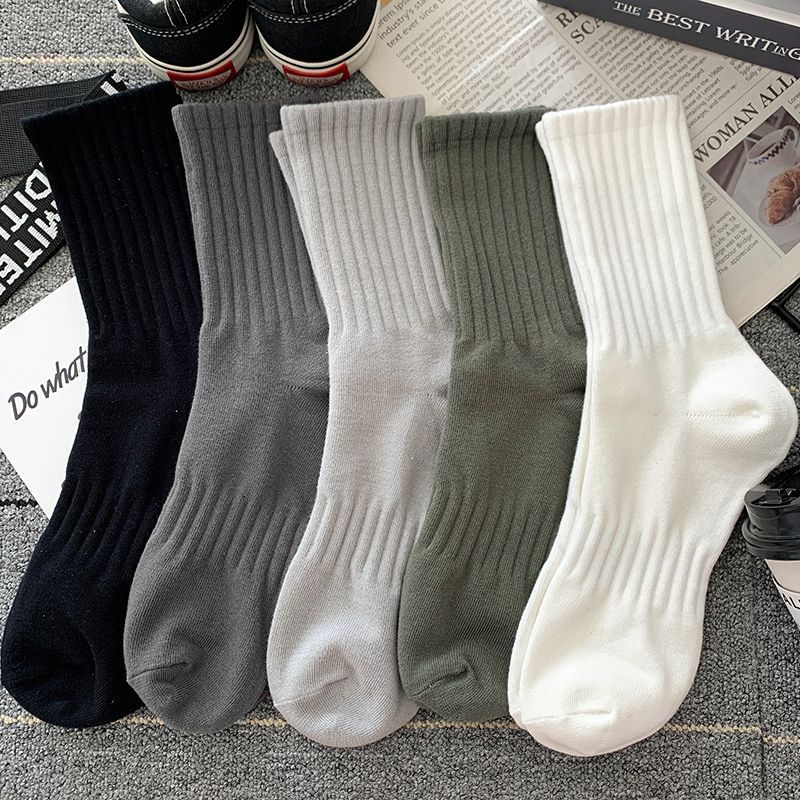 Socks men's autumn and winter new casual all-match solid color sports style basketball trend all-match socks men's tube socks