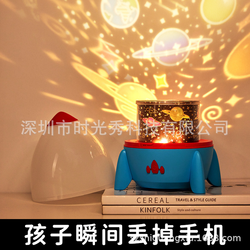 Cross-border new rocket projection light, starry sky light, remote control ambient light, creative music box, starry sky, night light, bedroom bed