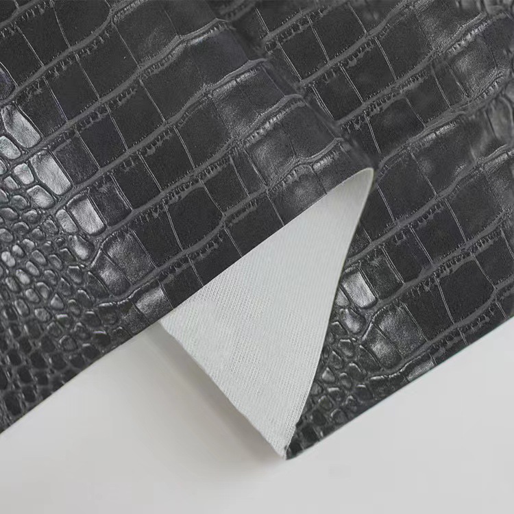 Picture of Factory wholesale spunlace fabric bottom crocodile pattern PVC leather luggage wine box packaging notebook cover artificial leather