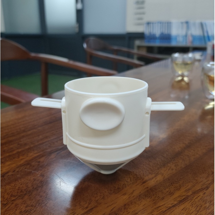 Picture of Household little angel portable coffee powder filter cup foldable hand punching double layer 304 stainless steel coffee filter