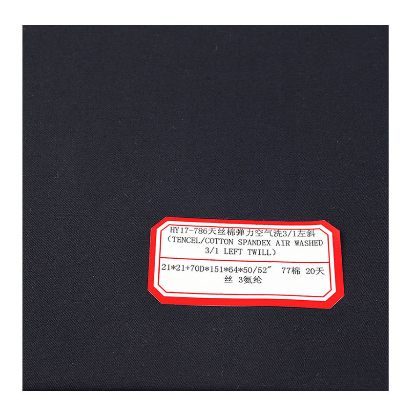 Tencel cotton elastic air wash 3/1 left oblique black Tencel cotton interwoven elastic twill 3/1 left oblique Tencel Cotton