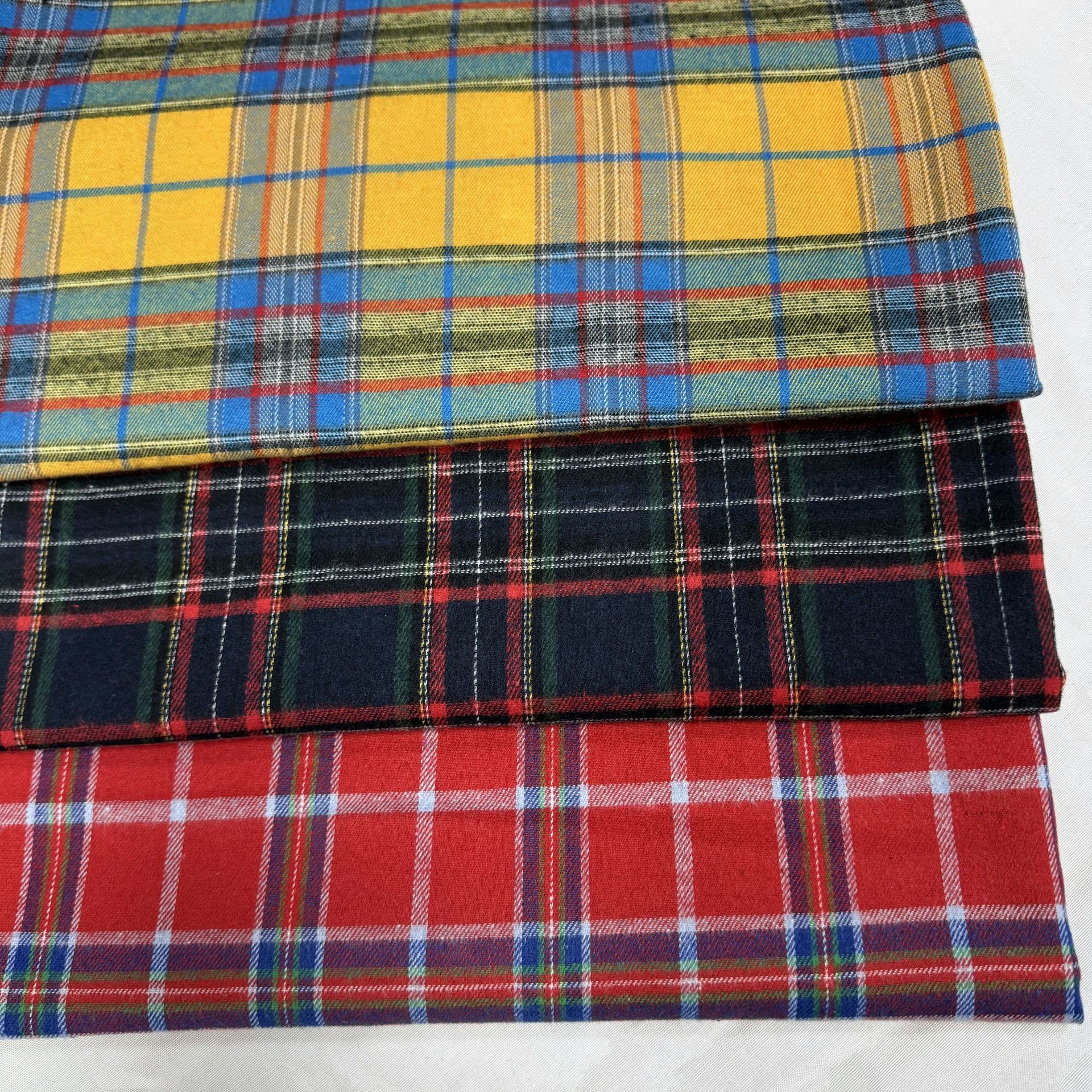 Polyester cotton shirt fabric fashion shoes and hats luggage fabric sanding yarn-dyed plier cross-border fabric in stock