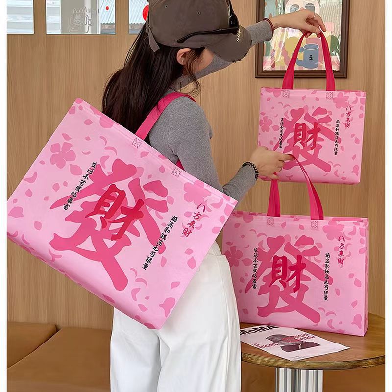 Non-woven handbag custom environmental protection shopping high-end sense bag custom high-grade color film advertising logo