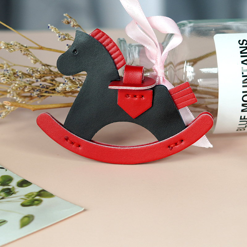 Picture of Factory wholesale rocking horse pendant bag decorative leather handmade pony pendant car pendant cowhide material bag