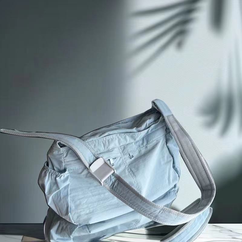 Picture of 2023 Sun Protection Waterproof Lightweight Canvas Bag with Multiple Pockets, Large Capacity, Casual Versatile Shoulder Crossbody Bag for Women, Summer
