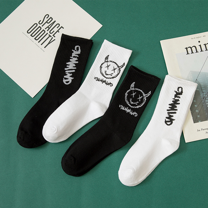 Picture of Distinctive Left and Right Foot Hip Hop Socks Women's Ins Trendy Cotton Mid-Tube Socks Women's Trendy Black and White Sports Socks Autumn